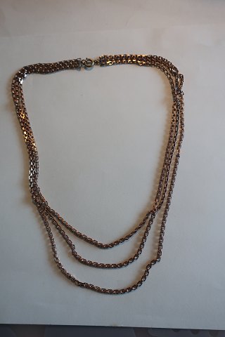 A beautiful and old necklace in 3 rows 
L: about 48cm
No stamp
In a good condition