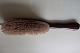 Klædebørste/fnugbørste i mørkt træ
Fra begyndelsen af 1900-tallet
L: 30cm